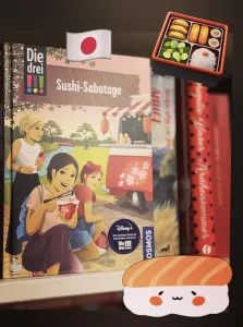 Buchcover mit den drei !!! die gerade Sushi essen