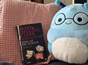 Dein ist die Schuld 2 Das Cover von Mary Higgins Clark Buch "Dein ist die Schuld" ist in schlichtem Schwarz gehalten und zeigt zwei weiße Rosen.