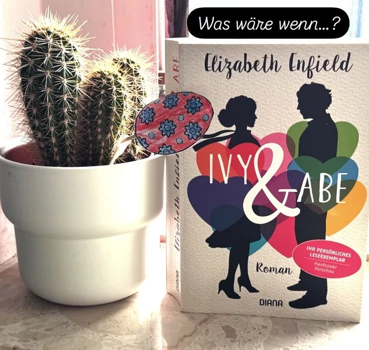 Auf dem weißen Cover sind die Silhouetten der beiden Protagonisten zu sehen, umzingelt von bunten Herzen.